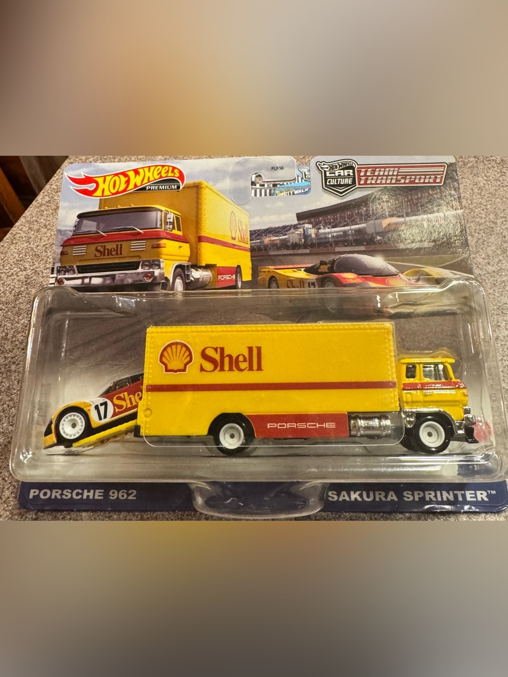 Hot Wheels Premium Shell Yellow Porsche Team Transporter Toy